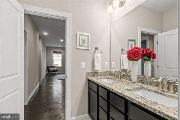 Bathroom, Dual Sink Vanities, Interior, Recessed Lighting, Wood Texture Flooring