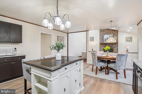 Dining room, Fireplace, Interior, Kitchen, Pendant Lights, Recessed Lighting, Stone Walls, Wood Texture Flooring