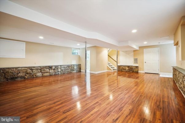 Empty room, Interior, Recessed Lighting, Stone Walls, Wood Texture Flooring