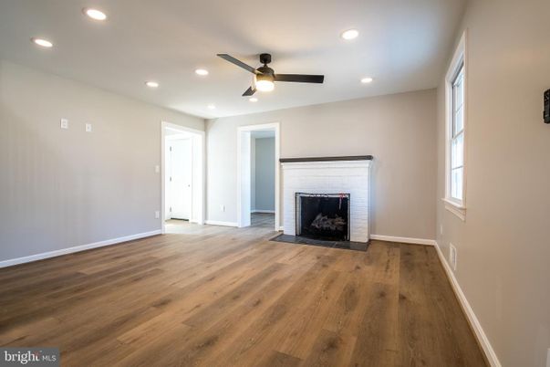 Empty room, Fireplace, Interior, Recessed Lighting, Wood Texture Flooring