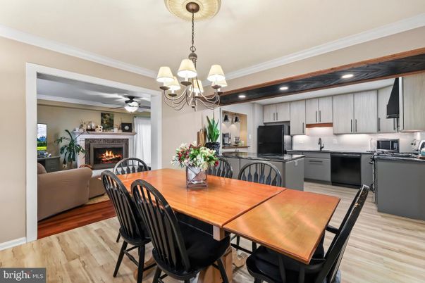 Chandelier, Dining room, Fireplace, Interior, Kitchen, Living room, Recessed Lighting, Wood Texture Flooring