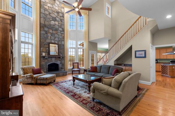 Fireplace, Interior, Kitchen, Living room, Recessed Lighting, Stone Walls, Wood Texture Flooring