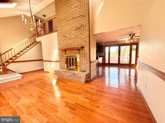 Chandelier, Fireplace, Interior, Stone Walls, Wood Texture Flooring