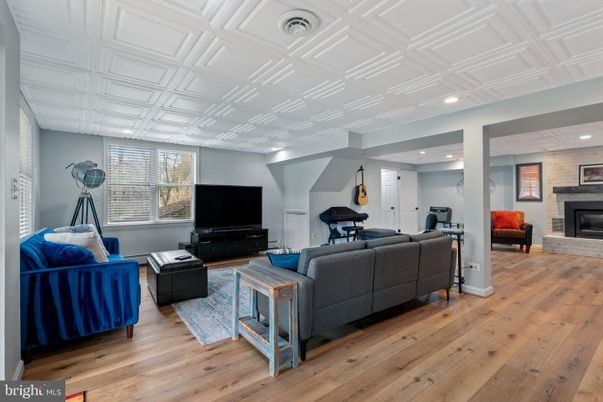 Fireplace, Interior, Living room, Piano, Recessed Lighting, Wood Texture Flooring
