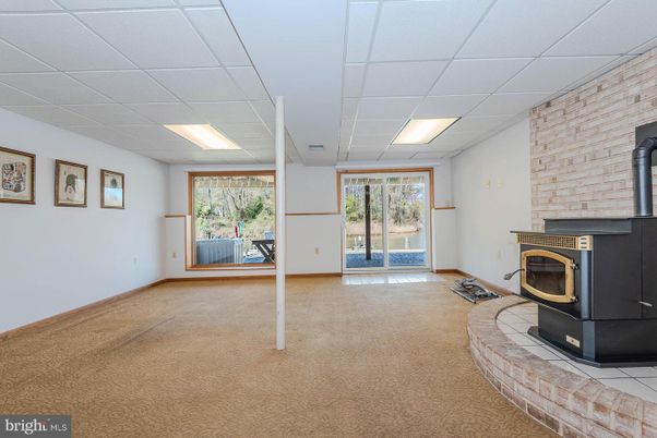 Empty room, Fireplace, Interior, Recessed Lighting, Stone Walls