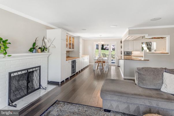 Dining room, Fireplace, Interior, Kitchen, Pendant Lights, Recessed Lighting, Stainless Steel Appliances, Wood Texture Flooring