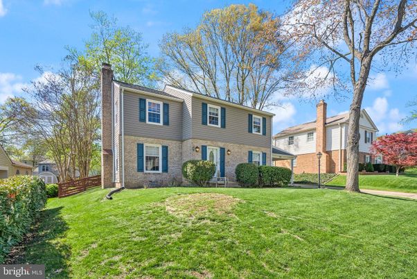 Backyard, Exterior, Facade, Brick Facade, Raised Ranch