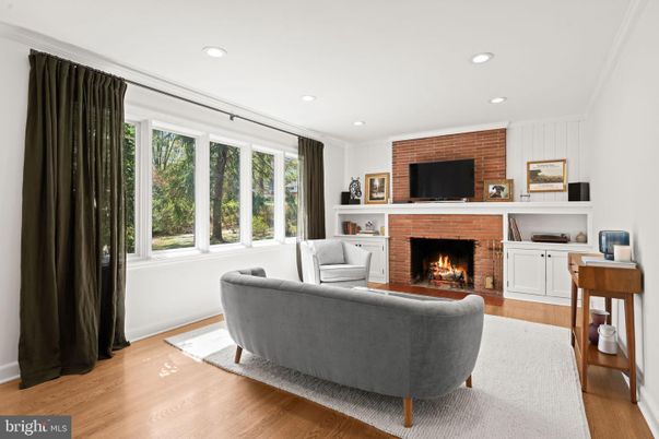 Fireplace, Interior, Living room, Recessed Lighting, Stone Walls, Wood Texture Flooring