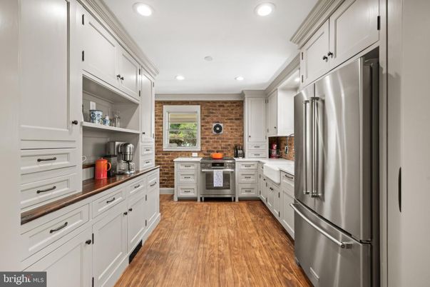 Interior, Kitchen, Recessed Lighting, Stainless Steel Appliances, Stone Walls, Wood Texture Flooring
