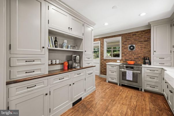 Interior, Kitchen, Recessed Lighting, Stainless Steel Appliances, Stone Walls, Wood Texture Flooring