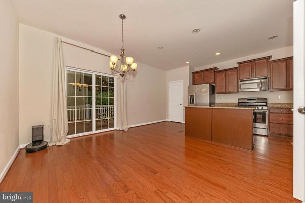Chandelier, Interior, Kitchen, Recessed Lighting, Stainless Steel Appliances, Wood Texture Flooring