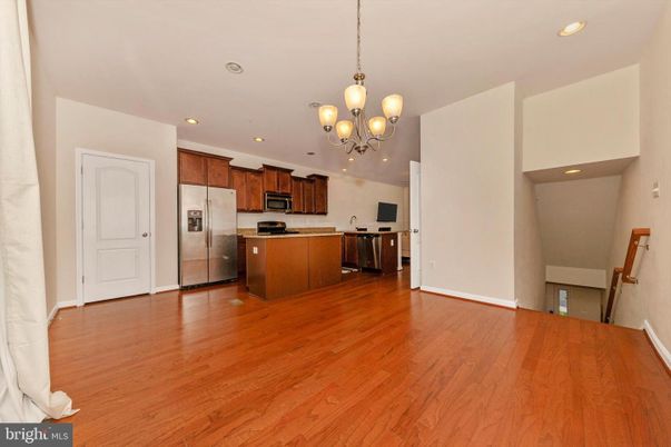 Chandelier, Interior, Kitchen, Recessed Lighting, Stainless Steel Appliances, Wood Texture Flooring