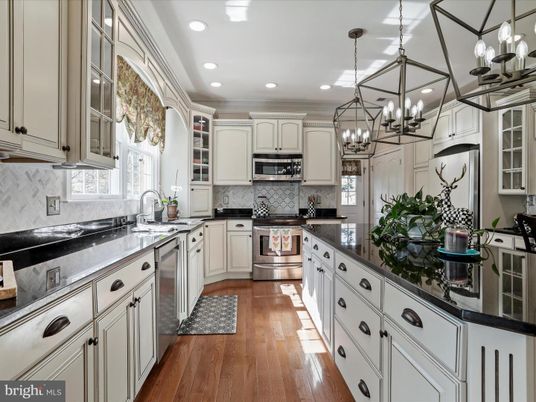 Chandelier, Interior, Kitchen, Pendant Lights, Recessed Lighting, Stainless Steel Appliances, Wood Texture Flooring