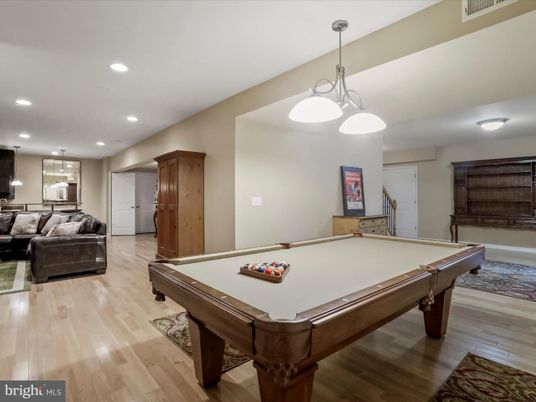 Billiard Table, Game Room, Interior, Living room, Pendant Lights, Recessed Lighting, Wood Texture Flooring