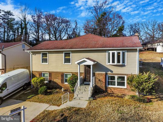 Exterior, Facade, Brick Facade, Raised Ranch