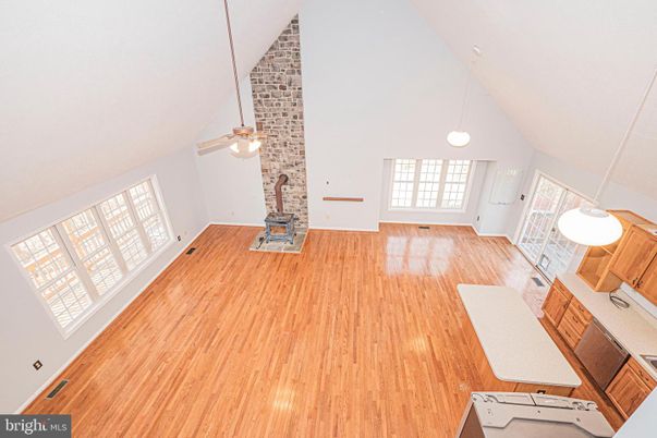 Fireplace, Interior, Pendant Lights, Stone Walls, Wood Texture Flooring