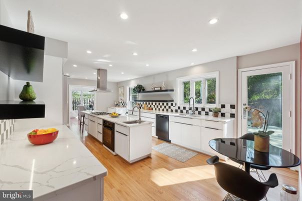 Dining room, Interior, Kitchen, Recessed Lighting, Stainless Steel Appliances, Wood Texture Flooring