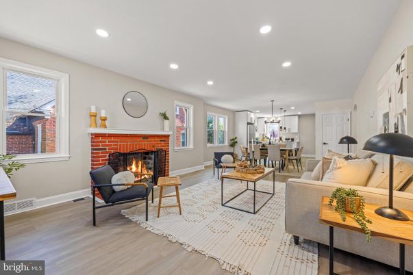 Dining room, Fireplace, Interior, Living room, Pendant Lights, Recessed Lighting, Wood Texture Flooring