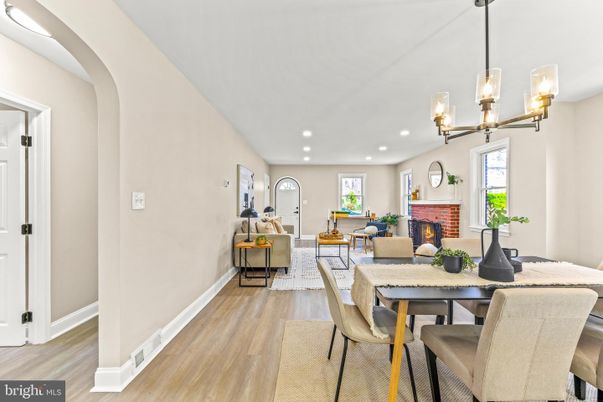 Dining room, Fireplace, Interior, Living room, Pendant Lights, Recessed Lighting, Wood Texture Flooring