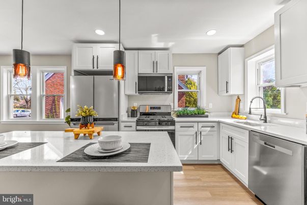 Interior, Kitchen, Pendant Lights, Recessed Lighting, Stainless Steel Appliances, Wood Texture Flooring