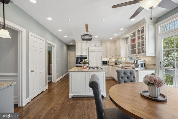 Dining room, Interior, Kitchen, Recessed Lighting, Stainless Steel Appliances, Wood Texture Flooring