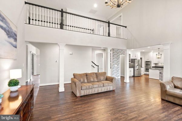 Chandelier, Interior, Kitchen, Pendant Lights, Recessed Lighting, Stainless Steel Appliances, Wood Texture Flooring