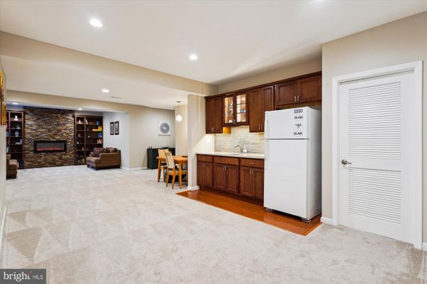 Dining room, Fireplace, Interior, Kitchen, Pendant Lights, Recessed Lighting, Stone Walls, Wood Texture Flooring