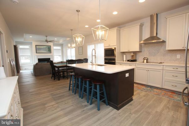 Fireplace, Interior, Kitchen, Pendant Lights, Recessed Lighting, Wood Texture Flooring