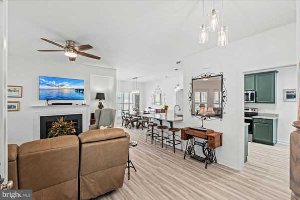 Dining room, Fireplace, Interior, Living room, Pendant Lights, Wood Texture Flooring