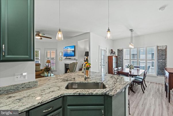 Dining room, Fireplace, Interior, Pendant Lights, Wood Texture Flooring