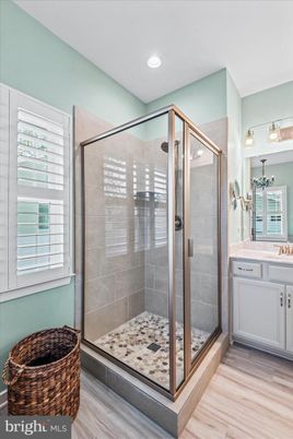 Bathroom, Glass Shower, Interior, Recessed Lighting, Wood Texture Flooring