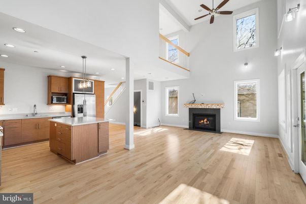 Fireplace, Interior, Kitchen, Pendant Lights, Recessed Lighting, Stainless Steel Appliances, Wood Texture Flooring