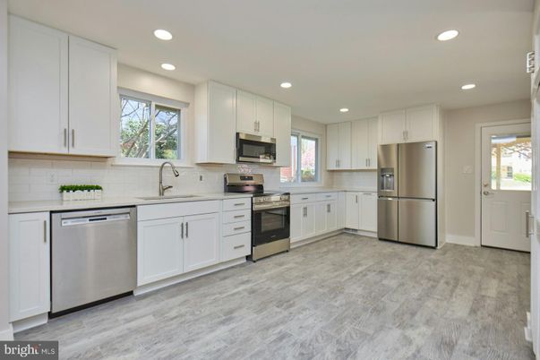 Interior, Kitchen, Recessed Lighting, Stainless Steel Appliances, Wood Texture Flooring