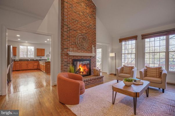 Fireplace, Interior, Kitchen, Living room, Recessed Lighting, Stone Walls, Wood Texture Flooring