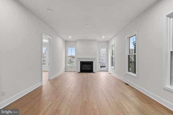 Empty room, Fireplace, Interior, Recessed Lighting, Wood Texture Flooring