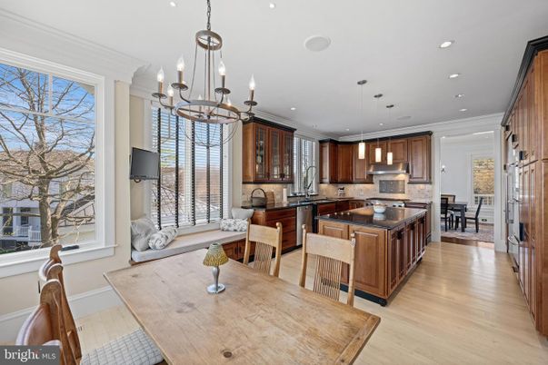 Chandelier, Dining room, Interior, Kitchen, Pendant Lights, Recessed Lighting, Stainless Steel Appliances, Wood Texture Flooring