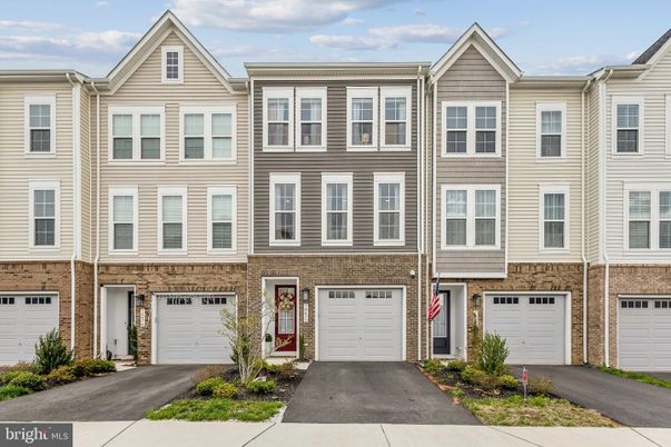 Attached, Exterior, Facade, Brick Facade, Rowhouse