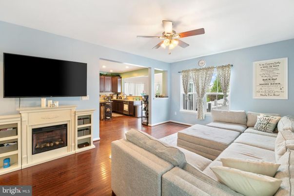 Fireplace, Interior, Kitchen, Living room, Recessed Lighting, Wood Texture Flooring