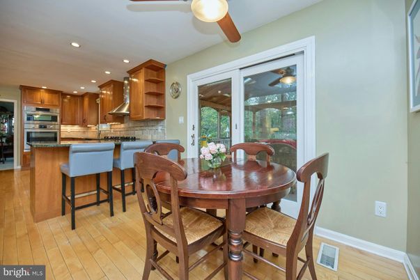 Dining room, Interior, Kitchen, Recessed Lighting, Stainless Steel Appliances, Wood Texture Flooring