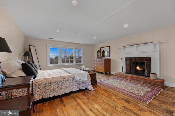 Bedroom, Fireplace, Interior, Recessed Lighting, Wood Texture Flooring
