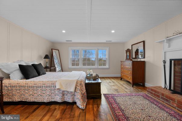 Bedroom, Fireplace, Interior, Recessed Lighting, Wood Texture Flooring