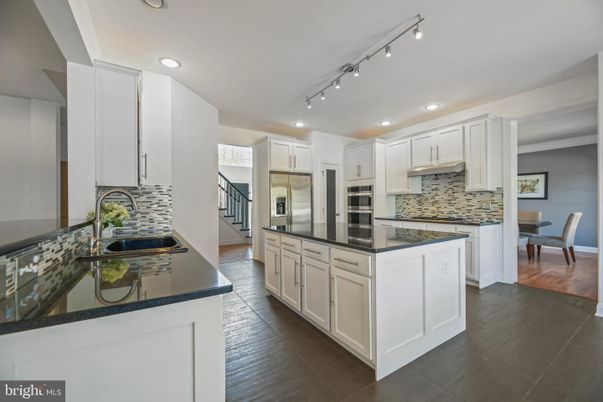 Dining room, Interior, Kitchen, Recessed Lighting, Stainless Steel Appliances, Wood Texture Flooring