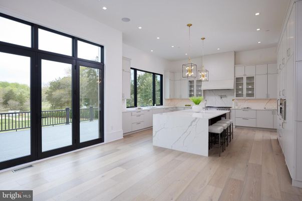 Interior, Kitchen, Marble Walls, Pendant Lights, Recessed Lighting, Wood Texture Flooring