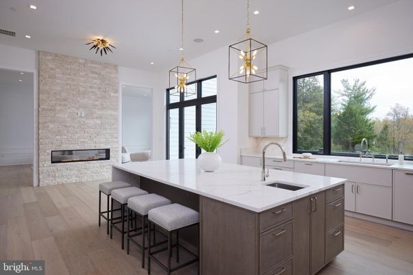 Fireplace, Interior, Kitchen, Pendant Lights, Recessed Lighting, Stone Walls, Wood Texture Flooring