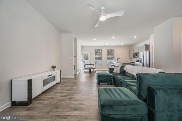 Dining room, Interior, Kitchen, Living room, Recessed Lighting, Stainless Steel Appliances, Wood Texture Flooring
