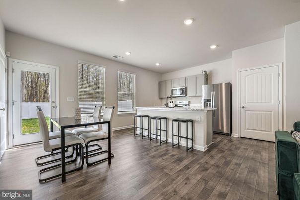 Dining room, Interior, Kitchen, Recessed Lighting, Stainless Steel Appliances, Wood Texture Flooring