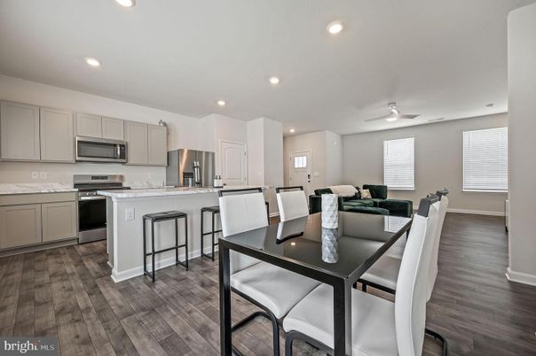 Dining room, Interior, Kitchen, Recessed Lighting, Stainless Steel Appliances, Wood Texture Flooring