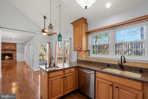 Fireplace, Interior, Kitchen, Pendant Lights, Recessed Lighting, Stone Walls, Wood Texture Flooring