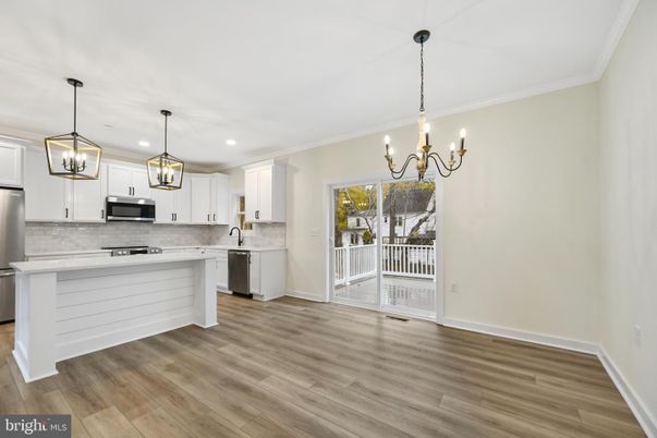 Chandelier, Interior, Kitchen, Pendant Lights, Recessed Lighting, Stainless Steel Appliances, Wood Texture Flooring
