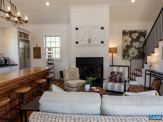 Chandelier, Fireplace, Interior, Kitchen, Living room, Recessed Lighting, Wood Texture Flooring